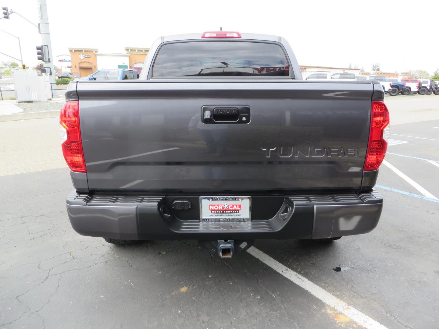 2021 CHARCOAL /GREY Toyota Tundra SR5 (5TFDY5F16MX) with an 5.7L V8 OHV 16V engine, automatic transmission, located at 2630 Grass Valley Highway, Auburn, CA, 95603, (530) 508-5100, 38.937893, -121.095482 - Features a Zone Offroad level kit, 20" SOTA wheels, 35" Nitto Ridge Grappler tires, Fox rear shocks, Air bags, front and rear TRD sway bars, and Window tint. - Photo#5